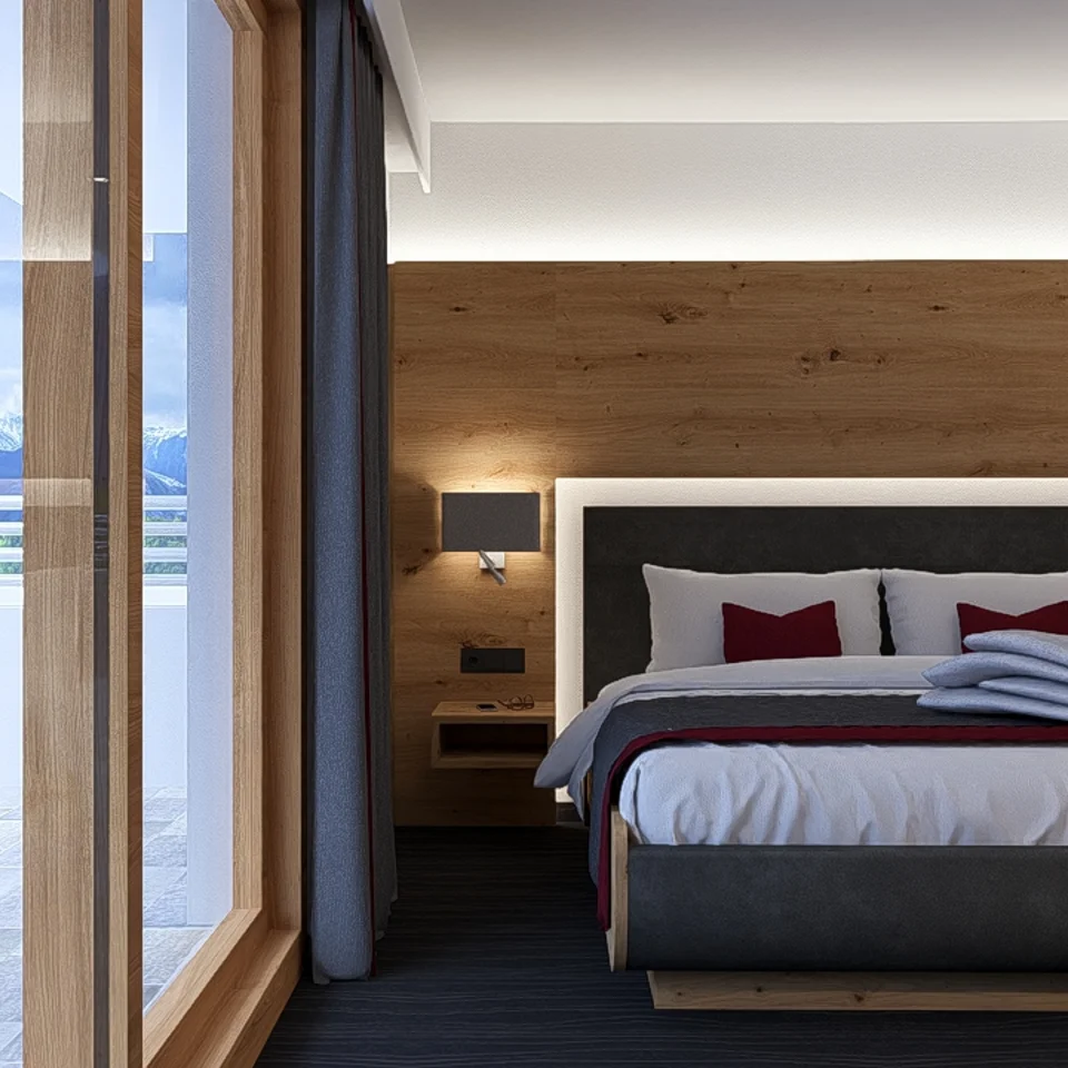 Modernes Hotelzimmer mit Balkon und Bergblick