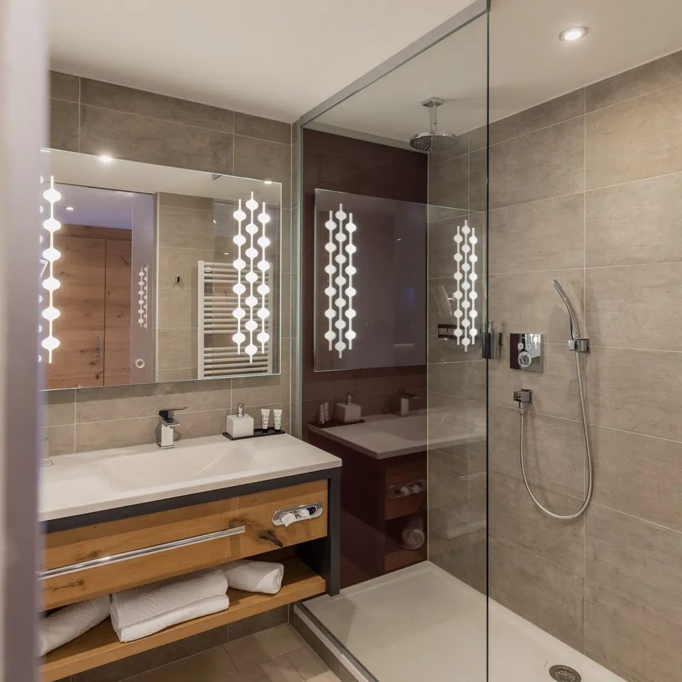 Modern bathroom with sink and shower enclosure